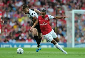 Arsenal V Udinese 2011-12 Prints: Theo Walcott vs Neuton: Arsenal's Battle in the UEFA Champions League Play-Off Against Udinese (2011)