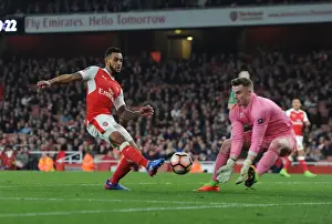 Theo Walcott vs. Paul Farman: A Battle in the Emirates FA Cup Quarter-Finals