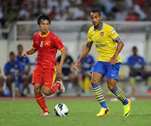Vietnam V Arsenal 2013-14 Prints: Theo Walcott vs Pham Nguyen Sa: Vietnam vs Arsenal Friendly, 2013