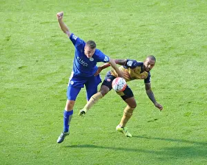 Leicester City V Arsenal 2015/16 Prints: Theo Walcott vs. Robert Huth: A Football Battle at the King Power Stadium (2015/16 Premier League)