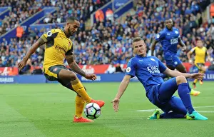 Leicester City V Arsenal 2016-17 Prints: Theo Walcott vs. Robert Huth: A Premier League Battle at The King Power Stadium