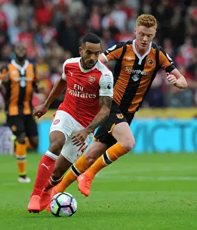 Theo Walcott vs. Sam Clucas: A Premier League Battle at KCOM Stadium