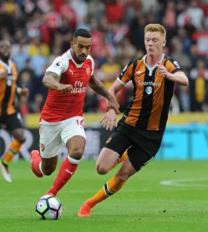 Theo Walcott vs Sam Clucas: A Premier League Showdown at KCOM Stadium