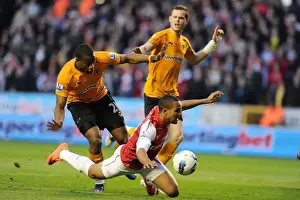 Wolverhampton Wanderers V Arsenal 2011-12 Prints: Theo Walcott vs Sebastien Bassong: Penalty Drama in Wolverhampton Wanderers vs Arsenal (2011-12)