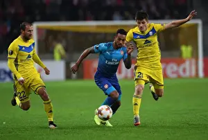 FC BATE Borisov V Arsenal 2017-18 Prints: Theo Walcott vs. Stanislav Dragun and Igor Stasevich: Intense Face-Off in Arsenal-BATE Europa League Clash
