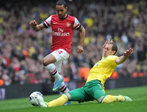 Arsenal V Norwich City 2012-13 Prints: Theo Walcott vs. Steven Whittaker: Intense Battle at Arsenal v Norwich City