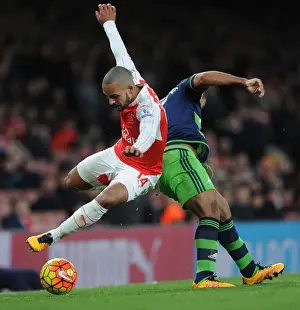 Theo Walcott vs Wayne Routledge: A Premier League Battle at Emirates Stadium