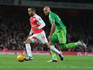 Arsenal Sunderland 2015-16 Prints: Theo Walcott vs. Younes Kaboul: A Battle of Wits and Skills at Arsenal's Emirates Stadium - Arsenal vs