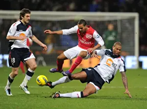 Bolton Wanderers V Arsenal 2011-12 Prints: Theo Walcott vs Zat Knight: Intense Battle at Bolton Wanderers vs Arsenal (2011-12)