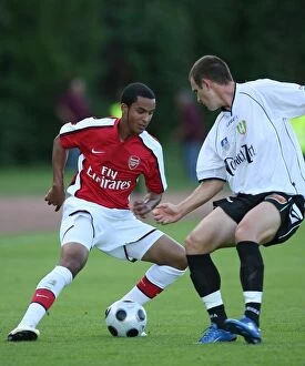 Images Dated 24th July 2008: Theo Walcott vs. Zoltan Csontos: Szombathely vs. Arsenal (2008)