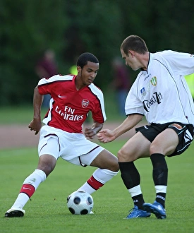 Szombathely V Arsenal 2008-09 Prints: Theo Walcott vs. Zoltan Csontos: Szombathely vs. Arsenal (2008)