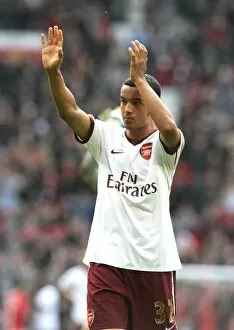Images Dated 14th April 2008: Theo Walcott waves to the Arsenal fabs after the match