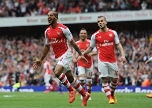 Arsenal v West Bromwich Albion 2014/15 Collection: Theo Walcott's Brace: Arsenal Secure Victory Over West Bromwich Albion (2014/15)