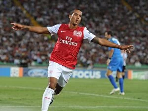 Images Dated 24th August 2011: Theo Walcott's Brace: Arsenal Secures UEFA Champions League Progress vs. Udinese