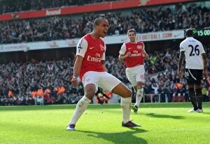 Images Dated 26th February 2012: Theo Walcott's Brace: Arsenal's Triumph over Tottenham in the 2011-12 Premier League