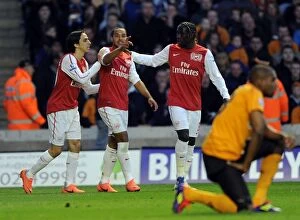 Wolverhampton Wanderers v Arsenal 2011-12 Collection: Theo Walcott's Brace: Arsenal's Victory Over Wolverhampton Wanderers in the Premier League