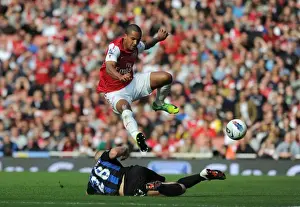 Theo Walcott's Brace Leads Arsenal to 3-1 Victory over Stoke City in Premier League
