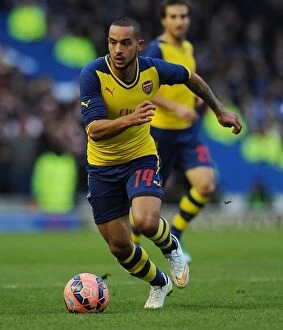 Images Dated 25th January 2015: Theo Walcott's Brilliant Performance: Arsenal Triumphs Over Brighton & Hove Albion in FA Cup