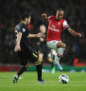 Wigan Athletic Collection: Theo Walcott's Brilliant Performance: Arsenal Crushes Wigan Athletic 4-1 in Premier League