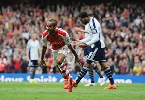 Arsenal v West Bromwich Albion 2014/15 Collection: Theo Walcott's Double: Arsenal Secures Dramatic Victory Over West Bromwich Albion (2014/15)