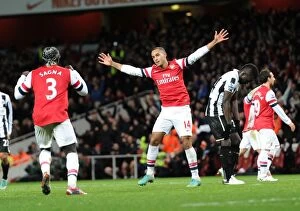 Arsenal v Newcastle United 2012-13 Collection: Theo Walcott's Double: Arsenal's Dominance over Newcastle United (December 2012)