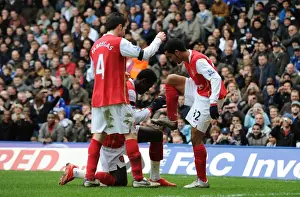 Theo Walcott's Double: A Celebration with Fabregas and Adebayor