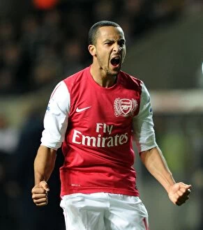Swansea City v Arsenal 2011-12 Collection: Theo Walcott's Double Strike: Arsenal's Victory over Swansea City (2011-12)