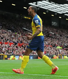Manchester United V Arsenal 2014-15 Prints: Theo Walcott's Dramatic Winner: Arsenal Triumphs over Manchester United in the Premier League 2014-15