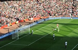 Images Dated 25th February 2012: Theo Walcott's Historic Rivalry-Defying Goal: Arsenal vs. Tottenham (2012)