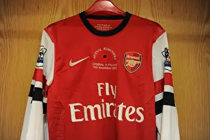 Arsenal V Fulham 2012-13 Prints: Theo Walcott's Poppy Shirt in Arsenal Changing Room (Arsenal vs Fulham, 2012-13)