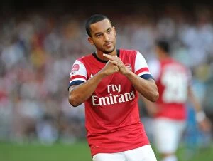 Images Dated 29th July 2012: Theo Walcott's Respectful Chinese Goal Celebration: Arsenal vs. Kitchee FC, Hong Kong, 2012