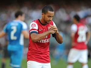 Images Dated 29th July 2012: Theo Walcott's Respectful Chinese Goal Celebration: Arsenal's First in Kitchee FC Friendly, 2012