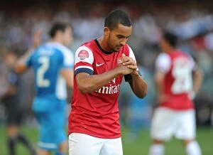 Images Dated 29th July 2012: Theo Walcott's Respectful Chinese Goal Celebration: Arsenal vs. Kitchee FC, 2012