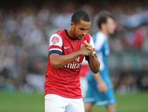 Images Dated 29th July 2012: Theo Walcott's Respectful Chinese Goal Celebration: Arsenal's Victory in Kitchee FC's 2012 Hong Kong