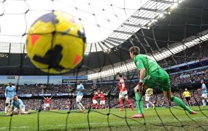 Manchester City Collection: Theo Walcott's Stunner: Arsenal's First Goal vs. Manchester City (2013-14)