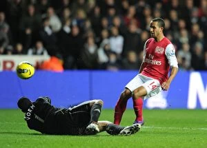 Swansea City v Arsenal 2011-12 Collection: Theo Walcott's Stunning Goal Past Michel Vorm: A Memorable Moment for Arsenal vs Swansea City
