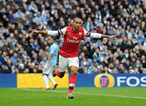 Manchester City v Arsenal 2013-14 Collection: Theo Walcott's Thrilling Goal: Arsenal's Victory at Manchester City, Premier League 2013-14