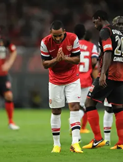 Nagoya Grampus V Arsenal 2013-14 Prints: Theo Walcott's Thrilling Goal: Arsenal's Victory over Nagoya Grampus in the 2013 Toyota Tour