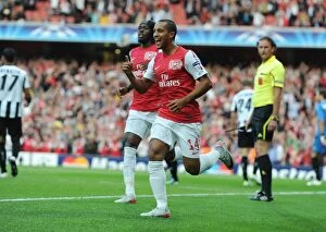 Arsenal v Udinese 2011-12 Collection: Theo Walcott's Thrilling Goal: Kickstarting Arsenal's Champions League Victory (2011-12)