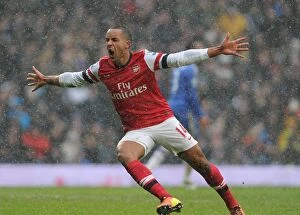 Images Dated 20th January 2013: Theo Walcott's Thrilling Goal: A Premier League Rivalry - Chelsea vs. Arsenal (2012-13)