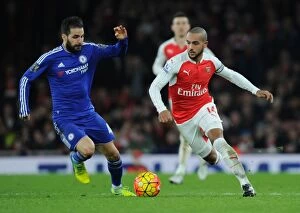 Images Dated 24th January 2016: Theo Walcott's Thrilling Run Past Cesc Fabregas: Arsenal vs. Chelsea, Premier League 2015-16
