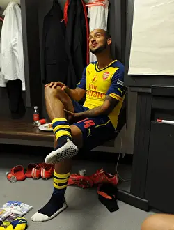 Theo Walcott's Triumphant FA Cup Celebration: Arsenal's Victory over Aston Villa