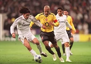 Henry Thierry Collection: Thierry Henry (Arsenal) Alvaro Mejia (Real). Real Madrid 0: 1 Arsenal