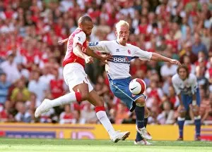 Images Dated 9th September 2006: Thierry Henry (Arsenal) Andrew Davies (Middlesbrough)