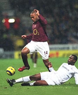 Bolton v Arsenal 2005-6 Collection: Thierry Henry (Arsenal) Bruno N Gotty (Bolton). Bolton Wanderers 2: 0 Arsenal