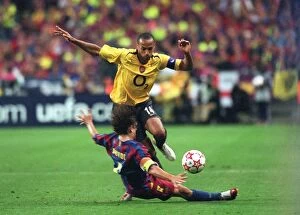 Images Dated 8th April 2008: Thierry Henry (Arsenal) Carlos Puyol (Barcelona)