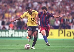 Images Dated 8th April 2008: Thierry Henry (Arsenal) Carlos Puyol (Barcelona)