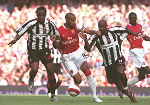 Thierry Henry (Arsenal) Claude Davis and David Sommeil (Sheff Utd)