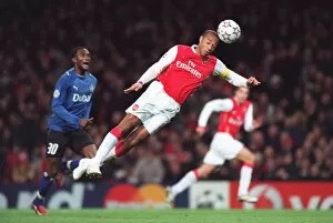 Images Dated 24th November 2006: Thierry Henry (Arsenal) Collin Benjamin (Hamburg)