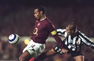 Arsenal v Juventus 2005-6 Gallery: Thierry Henry (Arsenal) Fabio Cannavaro (Juventus). Arsenal 2: 0 Juventus